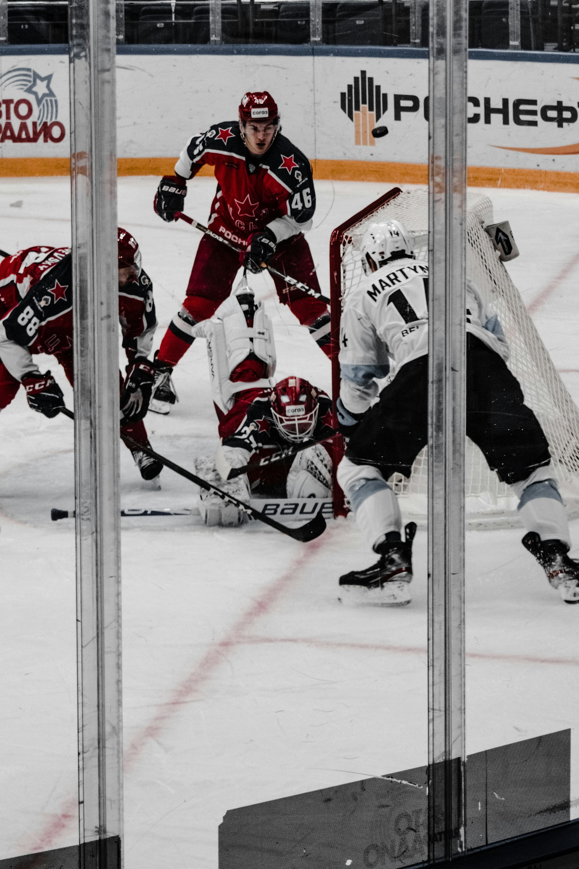 ice hockey players on ice hockey field